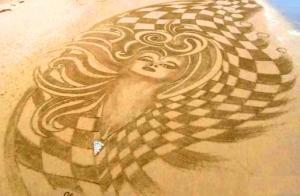 Sand Art - goddess w patterns on shoreline